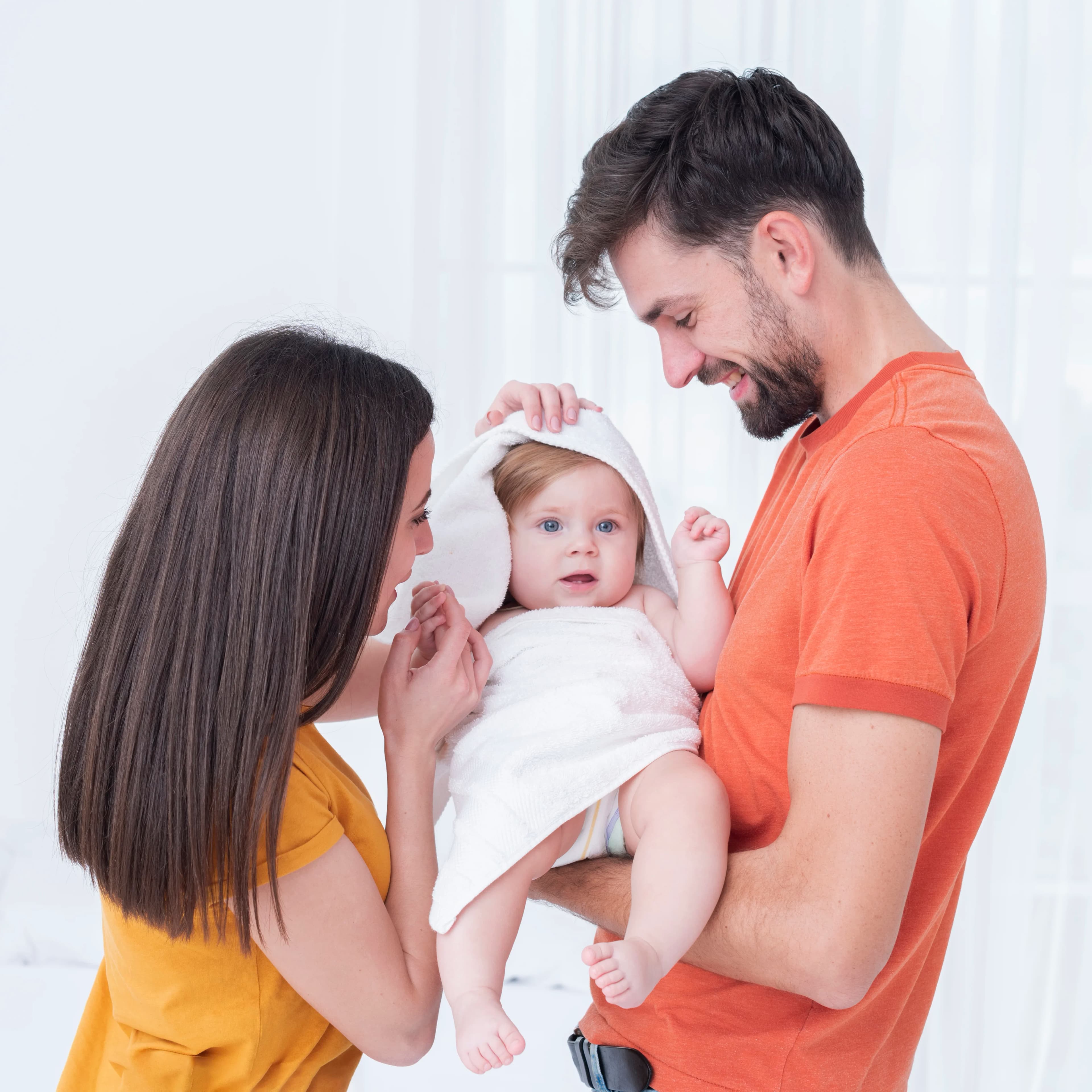 happy parents with newborn